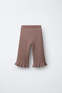 PANTALON EN MAILLE AVEC VOLANTS