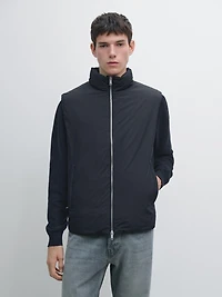 Veste sans manches ultralégère et déperlante en duvet mélangé