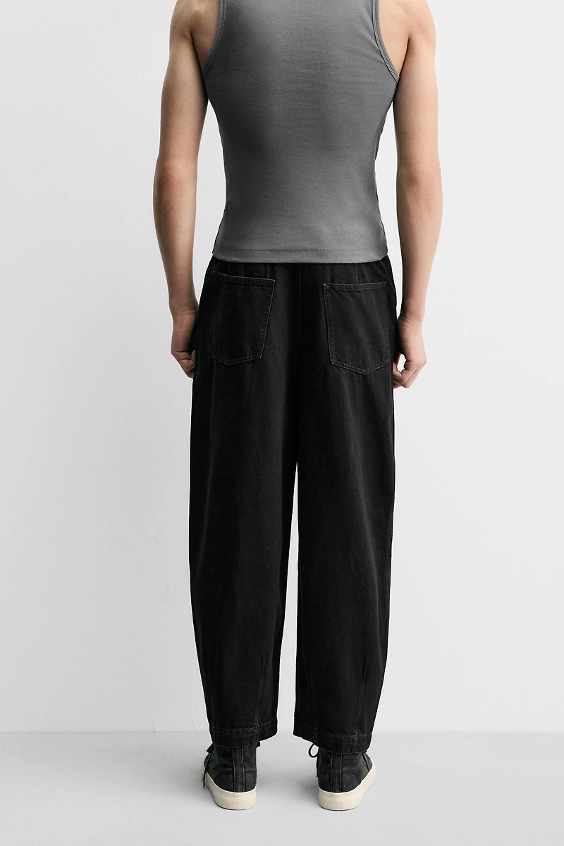 PLEATED WIDE FIT DENIM CHINO PANTS
