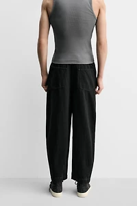PLEATED WIDE FIT DENIM CHINO PANTS