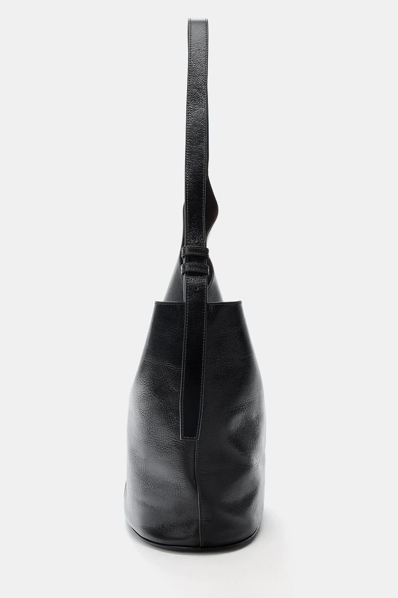 ASYMMETRIC LEATHER BUCKET BAG