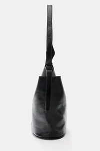 ASYMMETRIC LEATHER BUCKET BAG