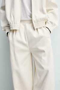 PLEATED WIDE FIT JOGGER PANTS