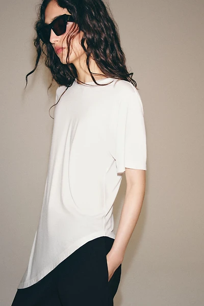 ASYMMETRIC SHORT SLEEVE TOP