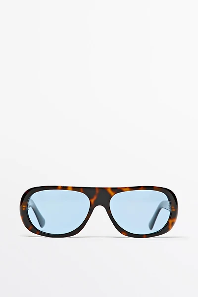 Wide tortoiseshell-effect sunglasses