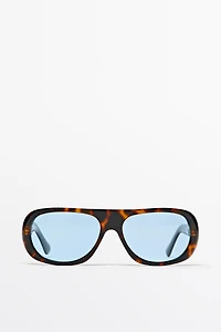 Wide tortoiseshell-effect sunglasses
