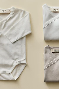 SET OF CHILDREN'S MOON BODYSUITS