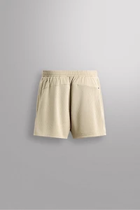 COMBINED PERFORATED SHORTS