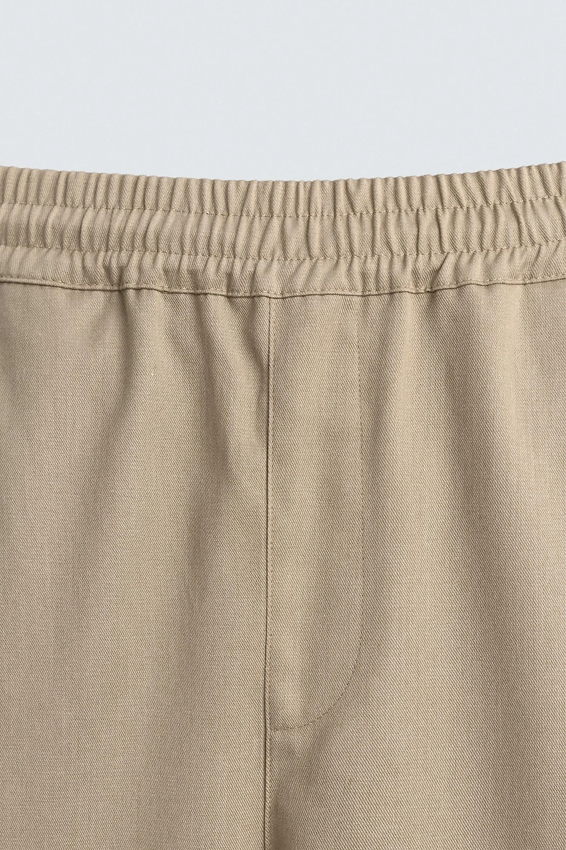 PANTALON BALLON FIT À PLIS