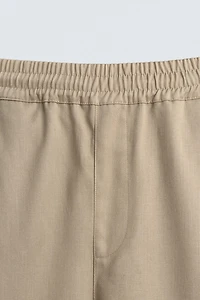 PANTALON BALLON FIT À PLIS