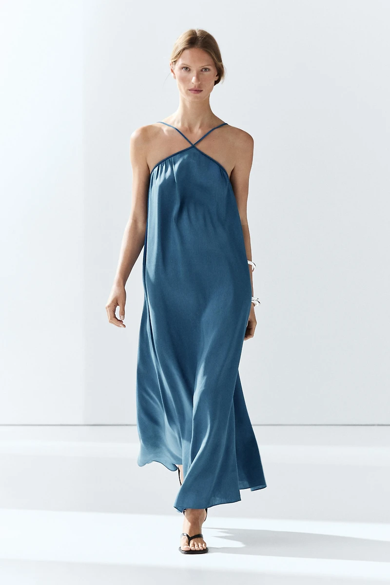 Long flowing dress with criss-cross straps