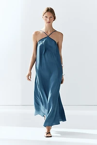 Long flowing dress with criss-cross straps