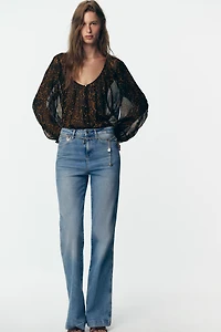 BLOUSE SEMI-TRANSPARENTE À IMPRIMÉ ANIMALIER