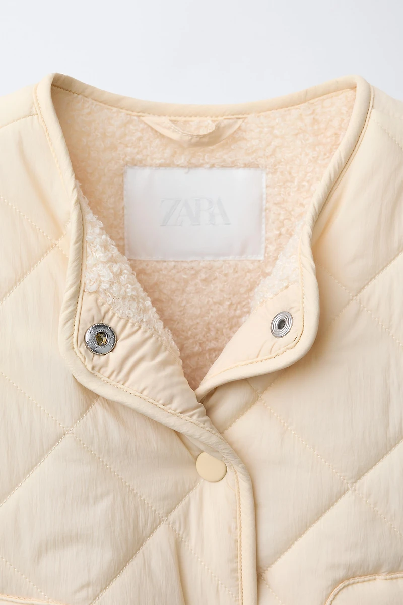 BLOUSON EN NYLON DÉPERLANT AVEC DOUBLURE MOUTONNÉE