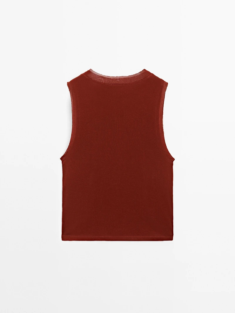 Sleeveless T-shirt with double piping