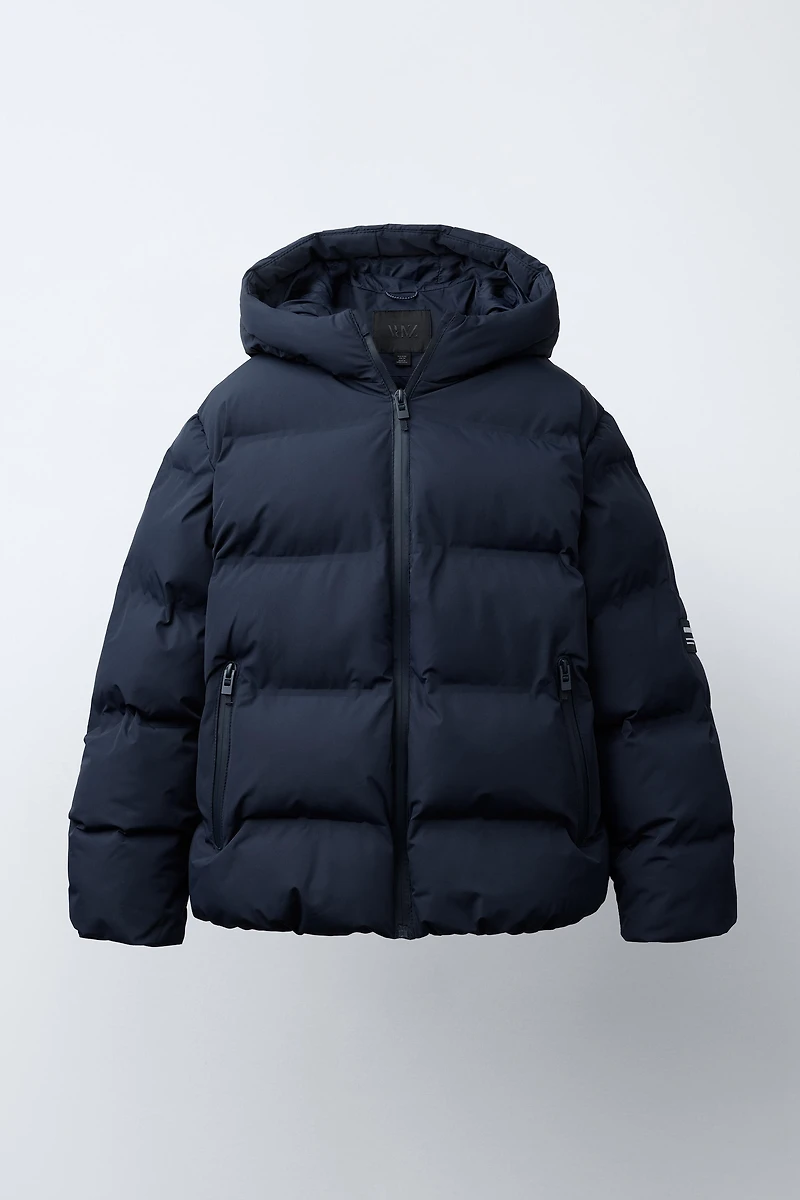 MANTEAU MATELASSÉ ÉTIQUETTE WATER REPELLENT