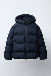 MANTEAU MATELASSÉ ÉTIQUETTE WATER REPELLENT