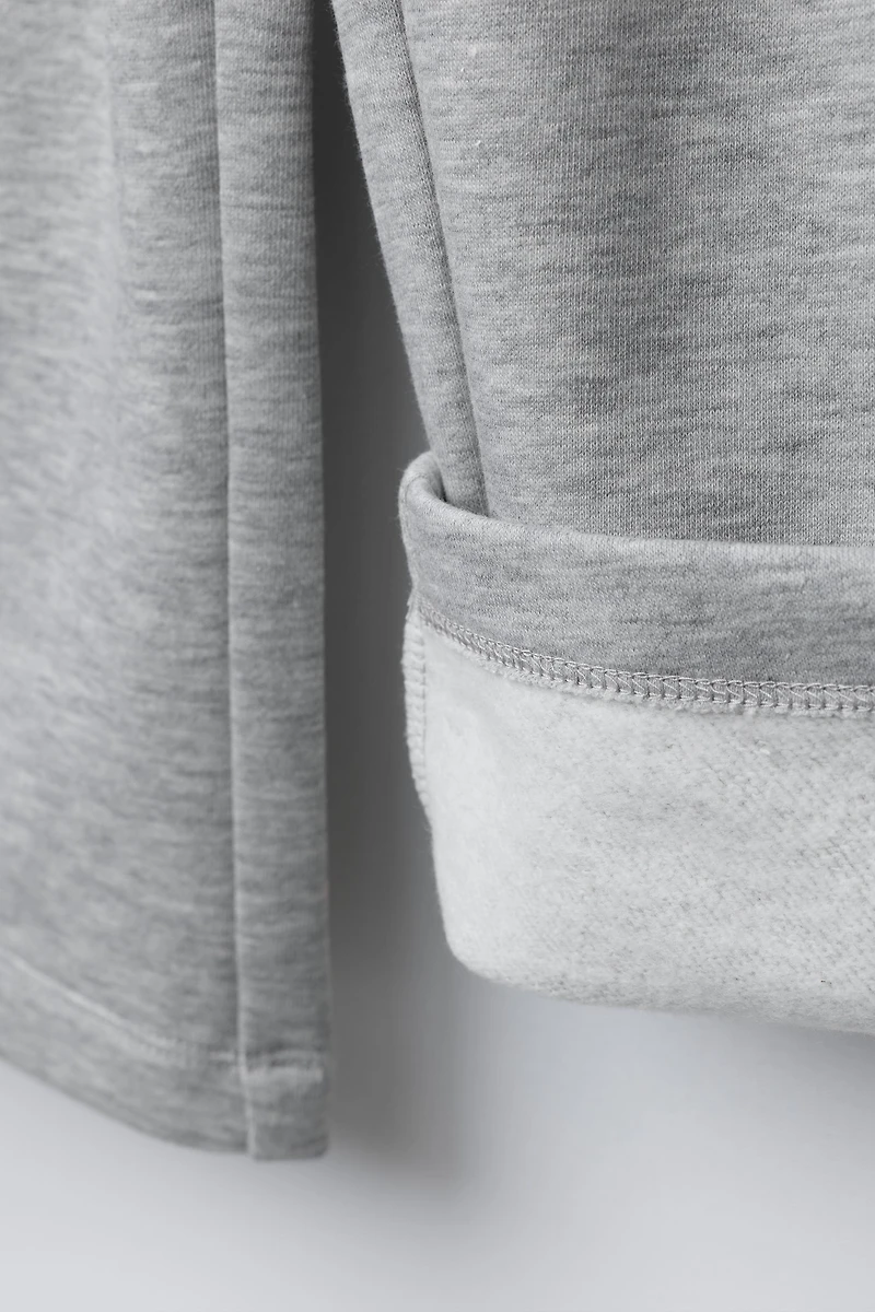 PANTALON EN MOLLETON À JAMBES LARGES