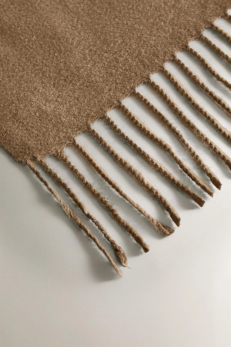 DECORATIVE FRINGED BLANKET
