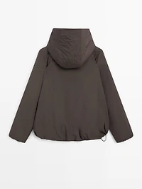 Veste bomber à capuche déperlante