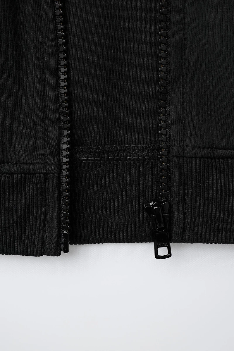 SWEAT INTERLOCK ZIPPÉ