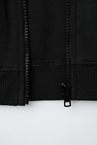 SWEAT INTERLOCK ZIPPÉ