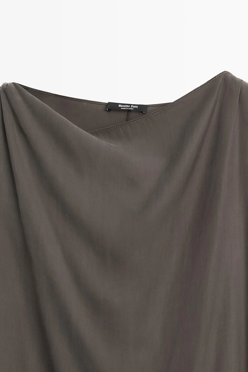 Asymmetric flowing cape top