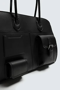 MULTI-POCKET TRAVEL BAG