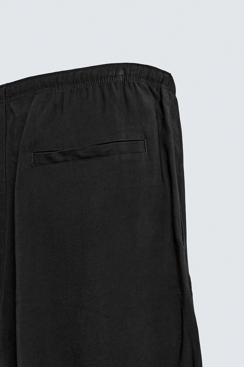 RELAXED FIT FLOWY PANTS