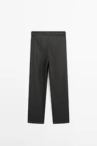 Striped trousers with wrap-style bow detail