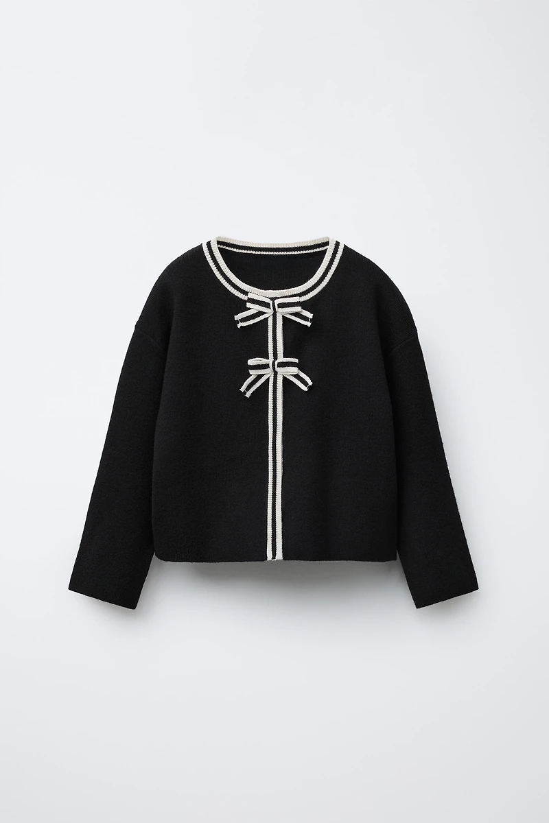 GILET EN MAILLE À NŒUDS