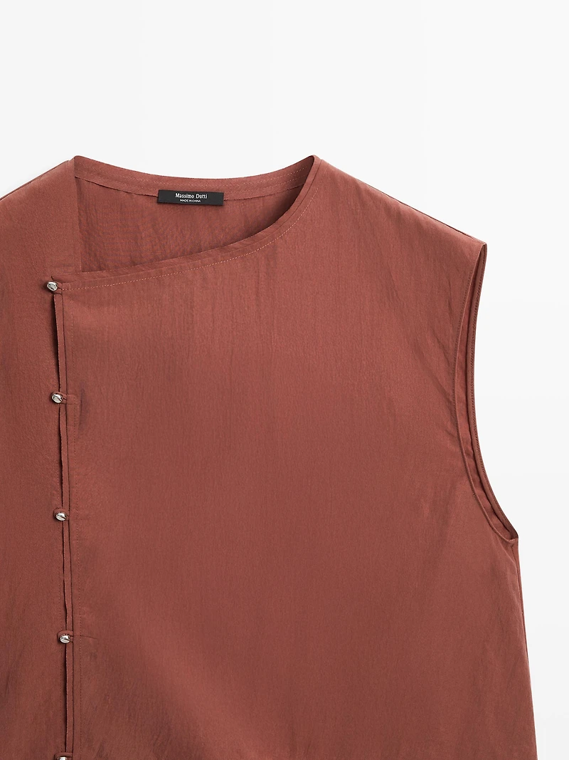 Blouse boutonnage côté argenté