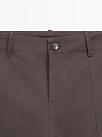Mid-rise carrot fit trousers