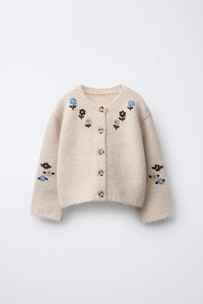 GILET EN MAILLE FLEURS BRODÉES