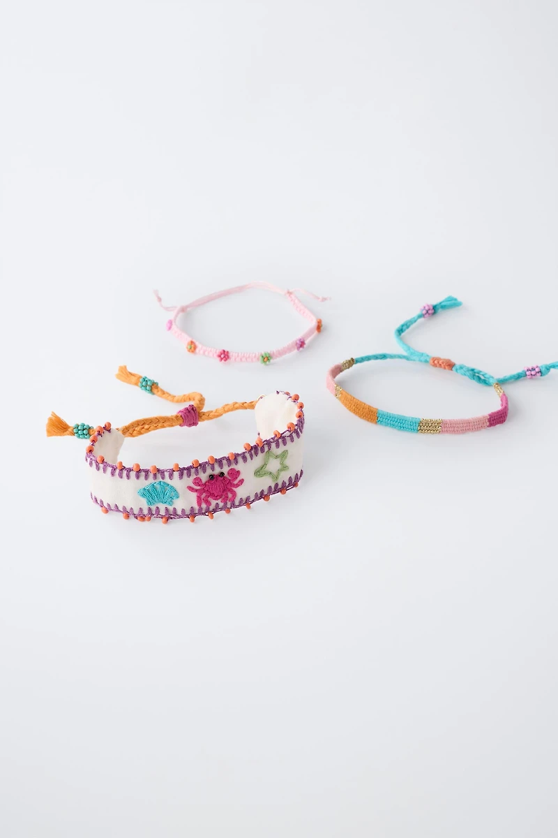 THREE-PACK OF EMBROIDERED AND BEADED BRACELETS