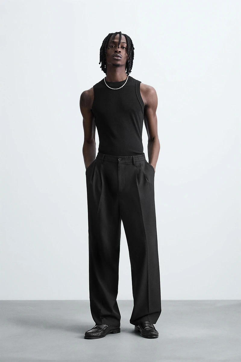 FLOWY PLEATED WIDE FIT PANTS