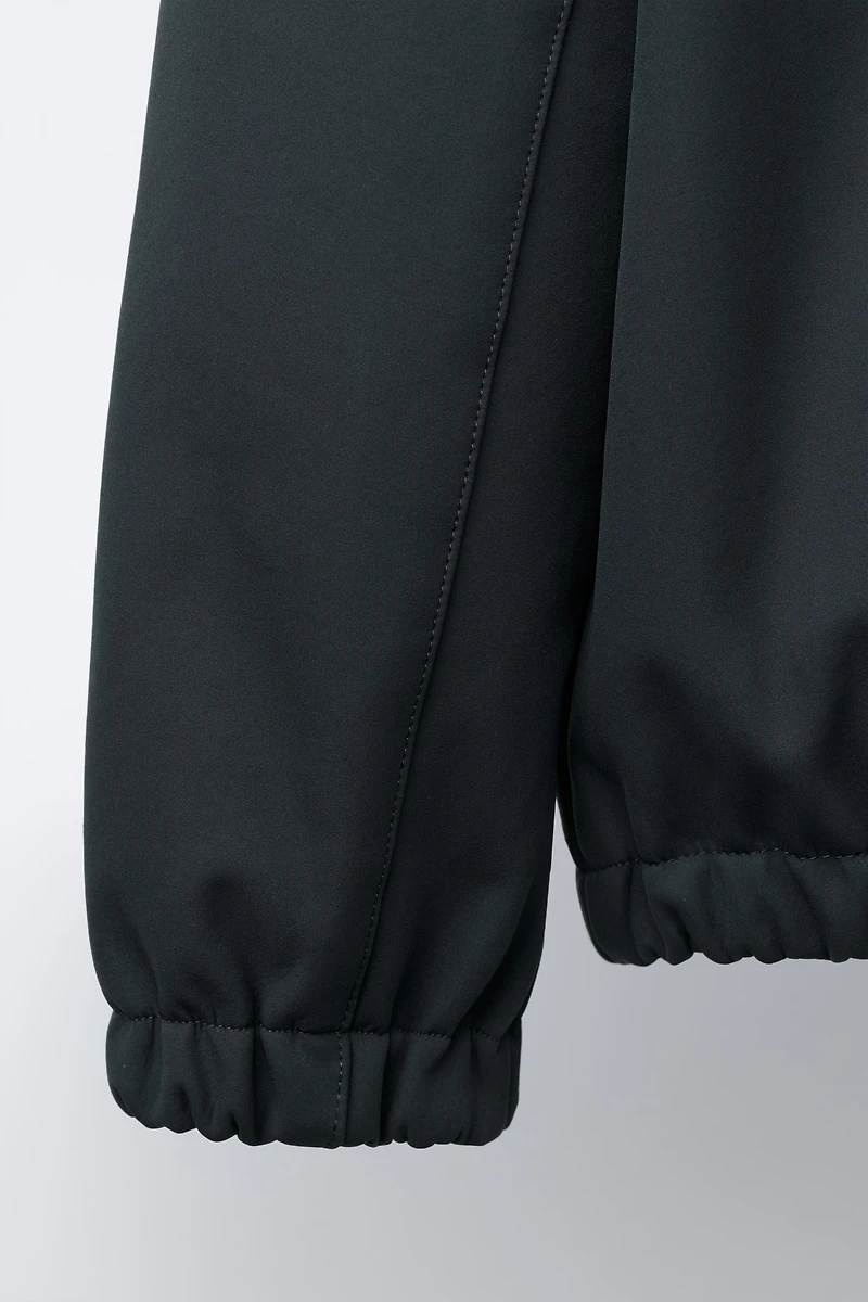 HOODED TECHNICAL JACKET