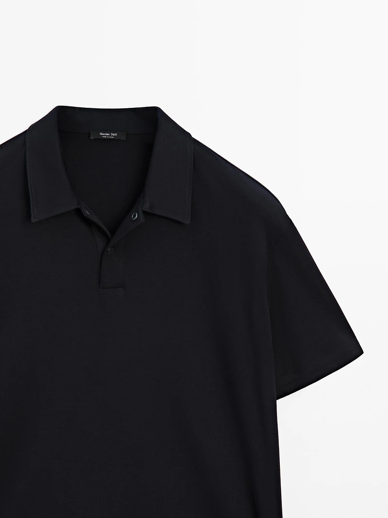 Polo à manches courtes et patte pressionnée