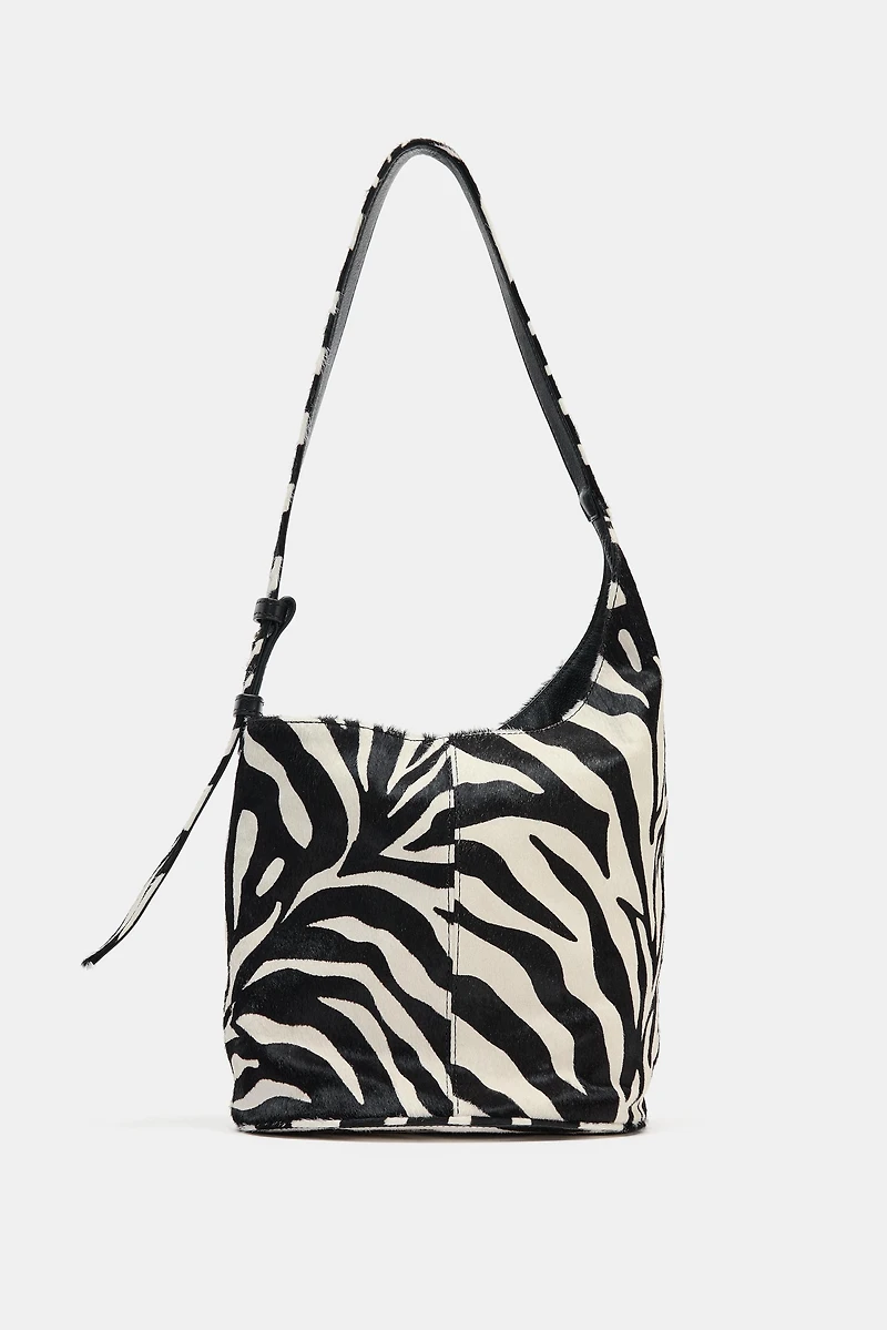 MINI SAC SEAU SOUPLE EN CUIR ASYMÉTRIQUE