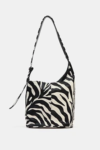 MINI SAC SEAU SOUPLE EN CUIR ASYMÉTRIQUE