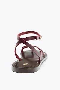FLAT LEATHER SANDALS WITH DECORATIVE STRAPS