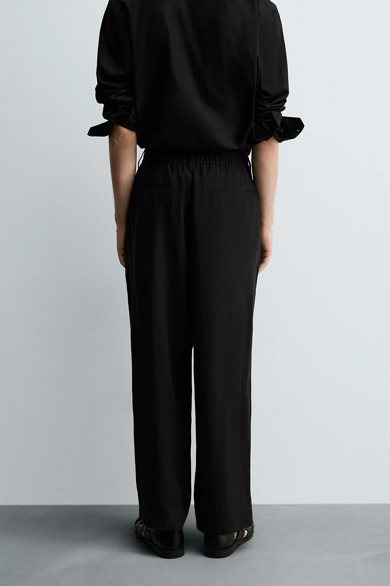 PLEATED FLOWY PANTS