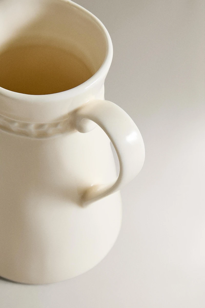 RAISED DESIGN CREAM PITCHER