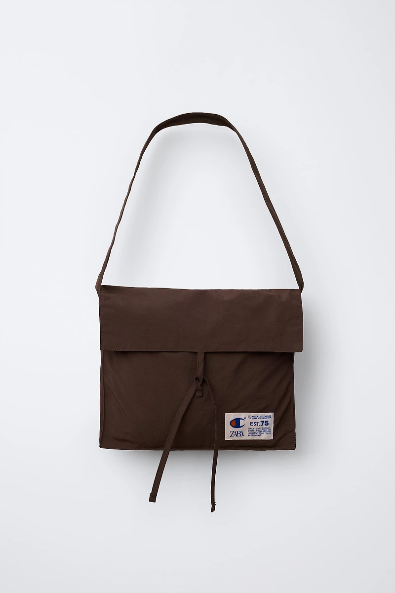 BLOUSON NYLON AVEC SAC CHAMPION ® X ZARA