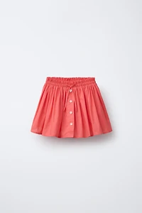 BUTTON SKORT