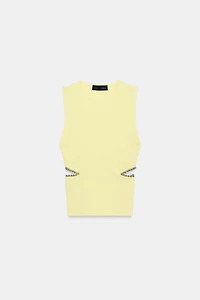 CUT OUT KNIT TOP WITH BEADS
