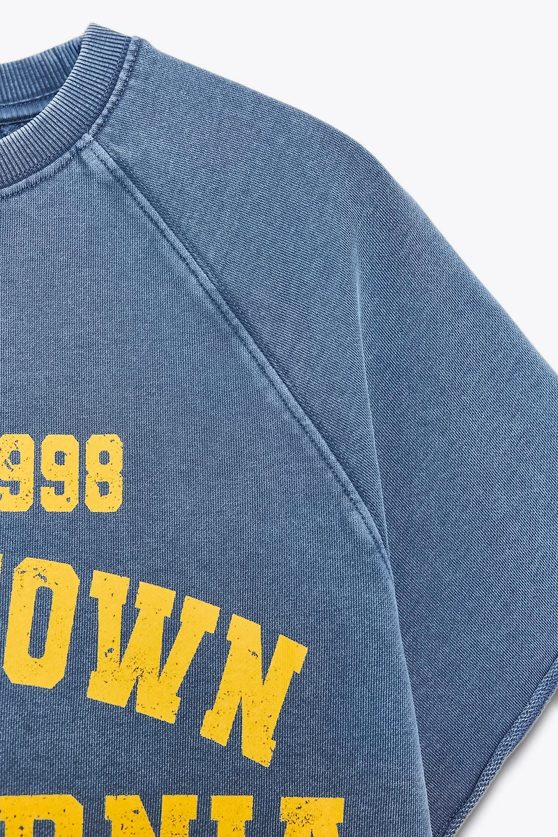 WASHED EFFECT TEXT PLUSH SWEATSHIRT