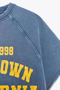 WASHED EFFECT TEXT PLUSH SWEATSHIRT