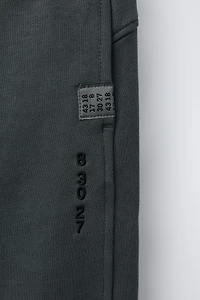 EMBROIDERED BALLOON PLUSH PANTS