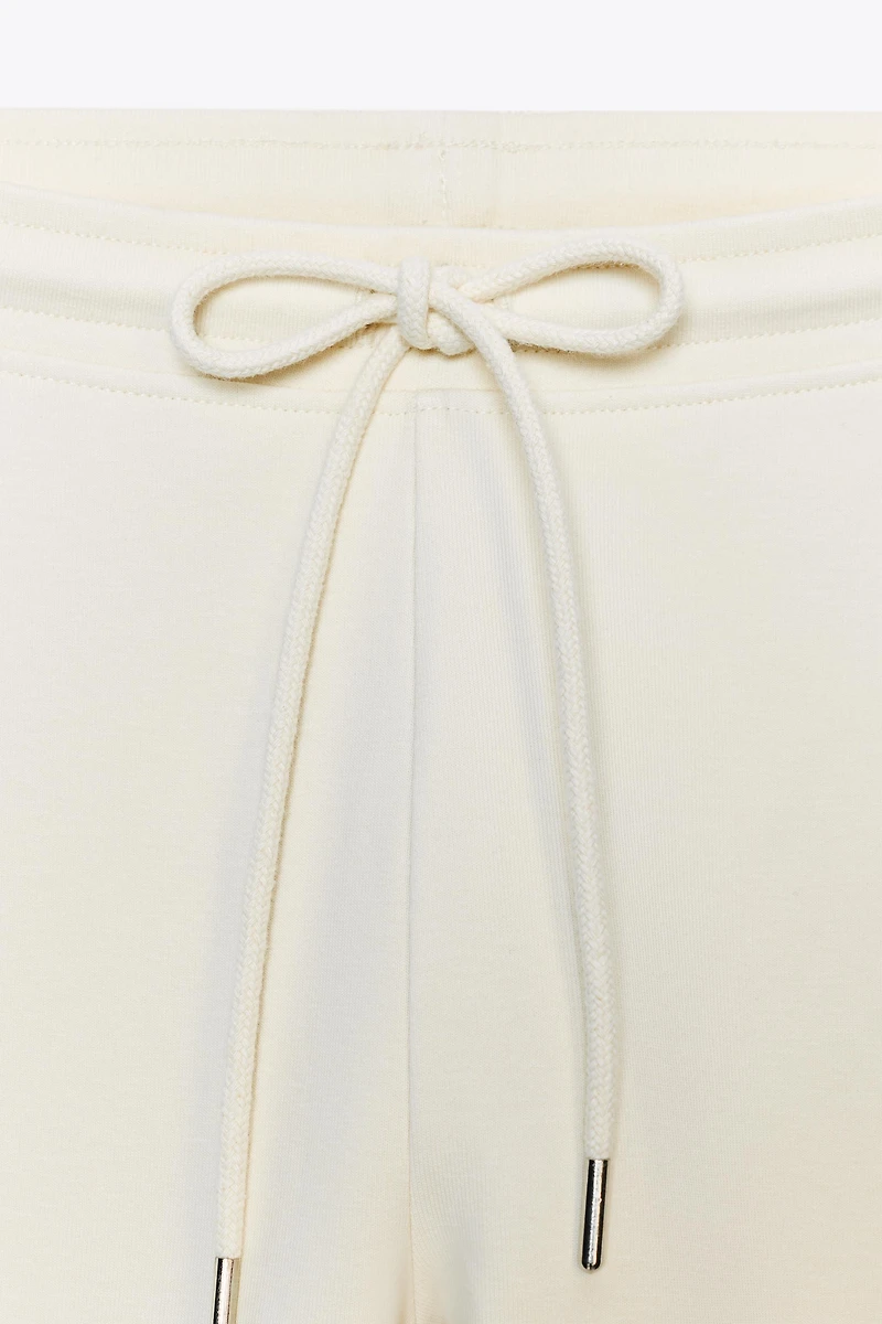 INTERLOCK FLARE PANTS